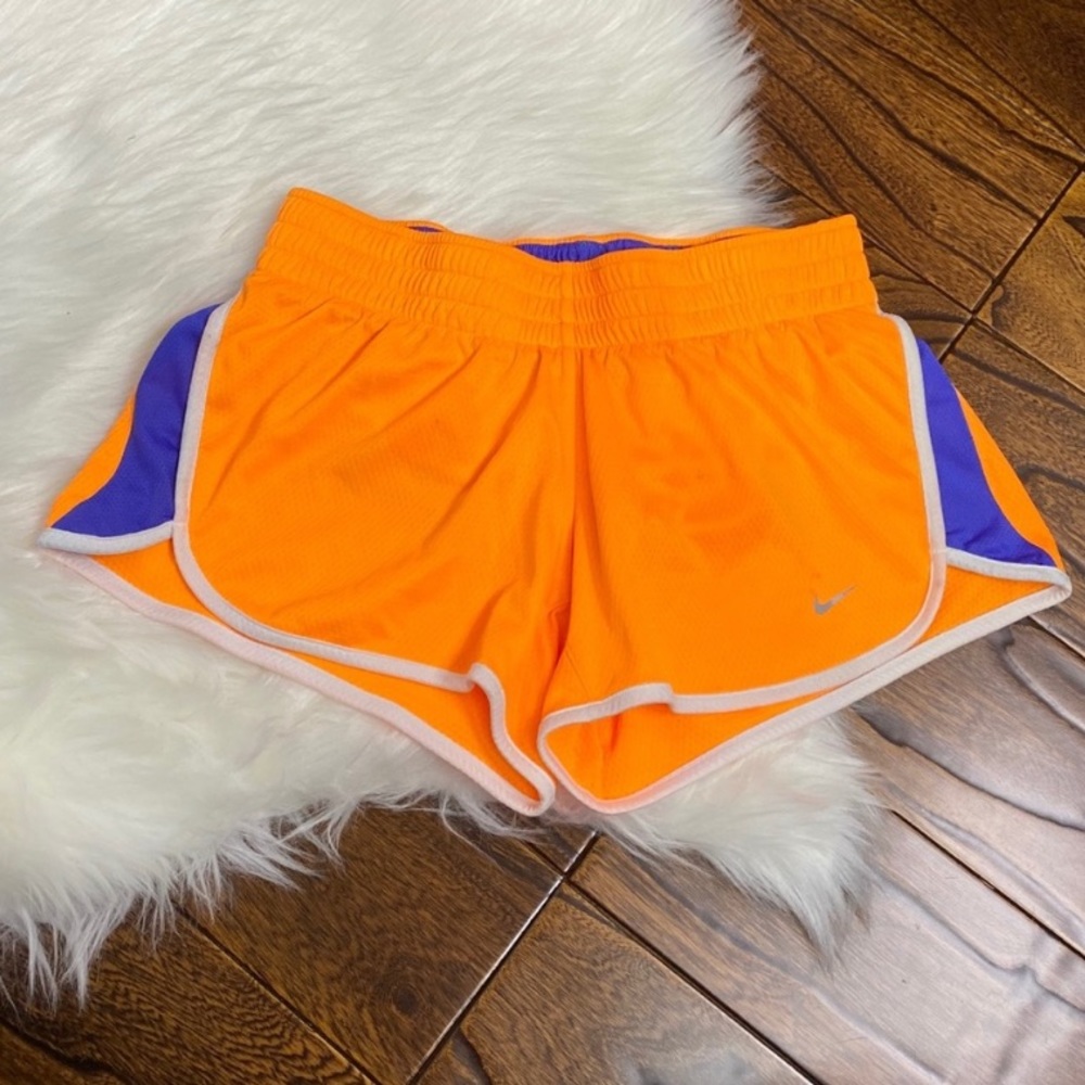 Nike orange and blue running shorts